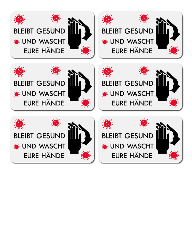 Es ist ein weißer Aufkleber auf weißem Hintergrund zu sehen. Auf dem Aufkleber sind rechts zwei Hände abgebildet die sich gerade die Hände einseifen. In der Mitte steht der Text: Bleibt Gesund Und Wascht Eure Hände. Rundherum sind 4 pinkfarbene Symbole für Corona-Viren abgebildet.